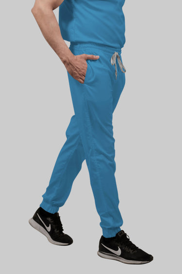 Stretchable (2Way) Female Peacock Blue Mandarin Neck With Jogger Scrub Set